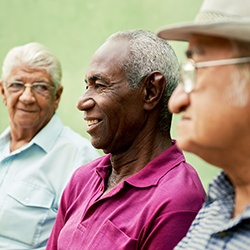 group of older men talking