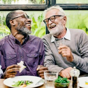 older people smiling and laughing together