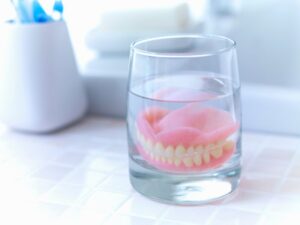 dentures soaking in water overnight